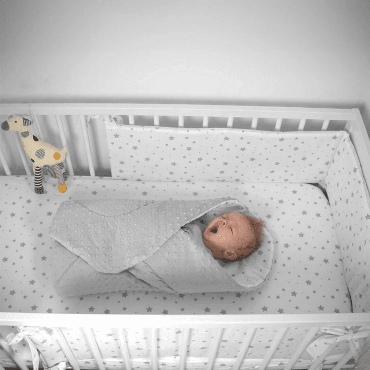 Stella Vendbar Grå Babypose